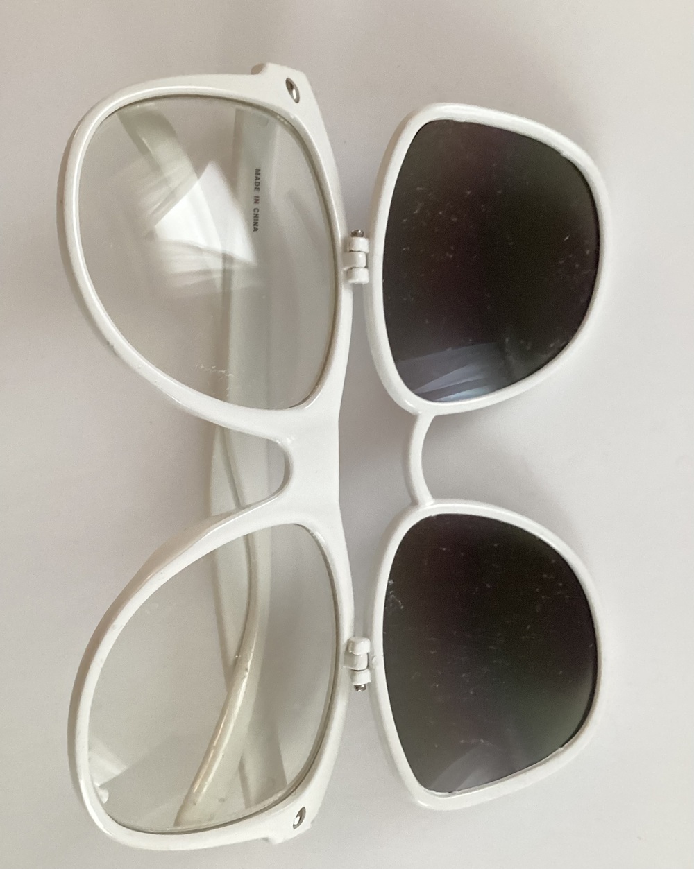 Flip Up Sunglasses Holographic Sun to Clear White Frames Adam Levine